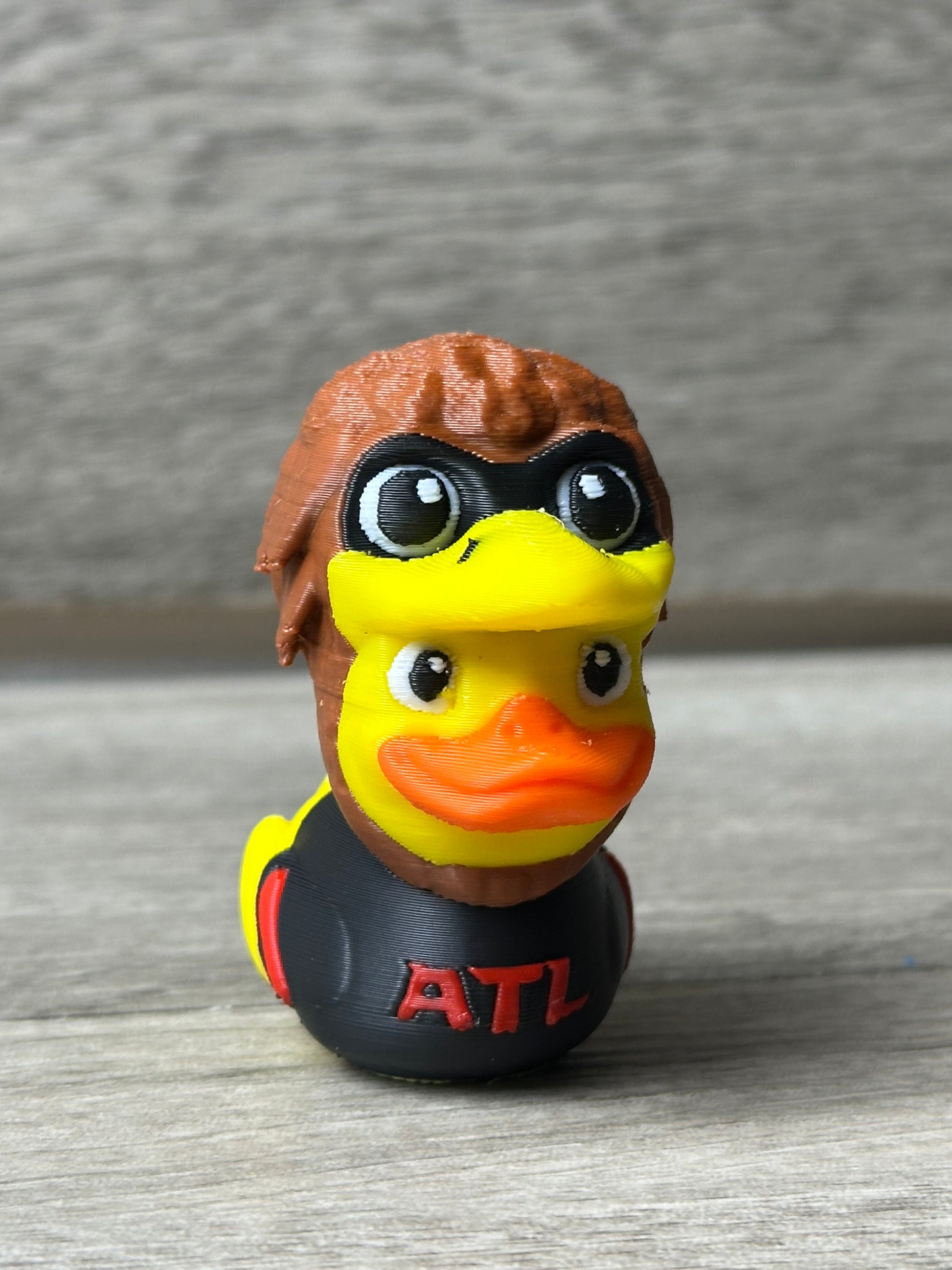 3D printed Atlanta Falcons football duck figurine, detailed team logo, collectible fan decor, perfect NFL gift idea