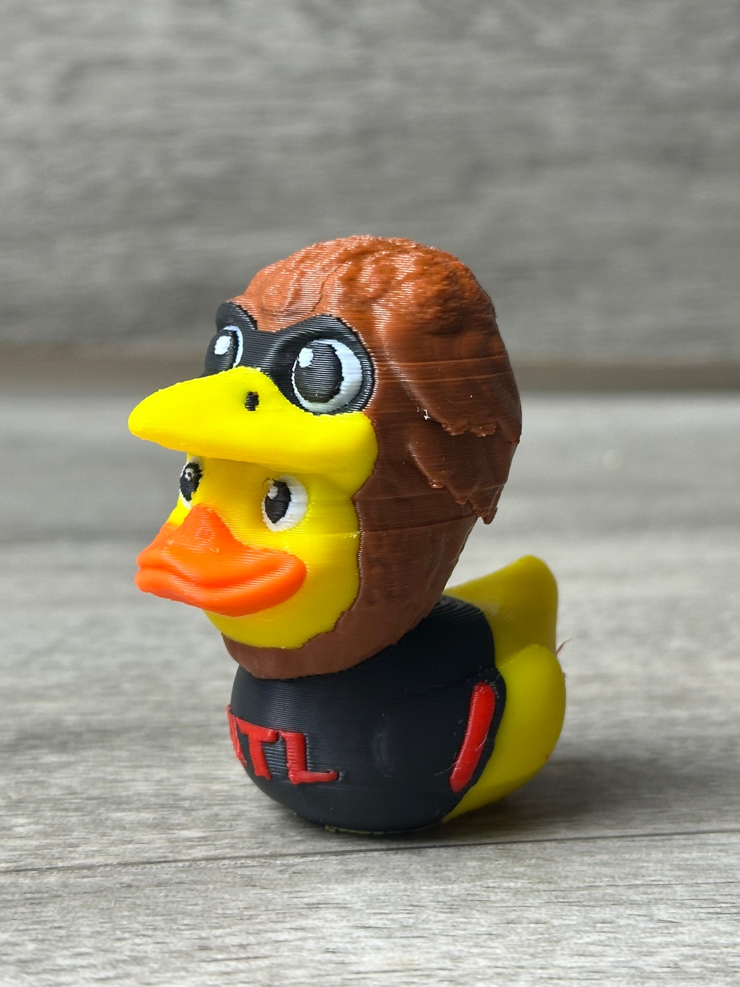 3D printed Atlanta Falcons football duck figurine, detailed fan collectible, perfect NFL team decor and gift idea