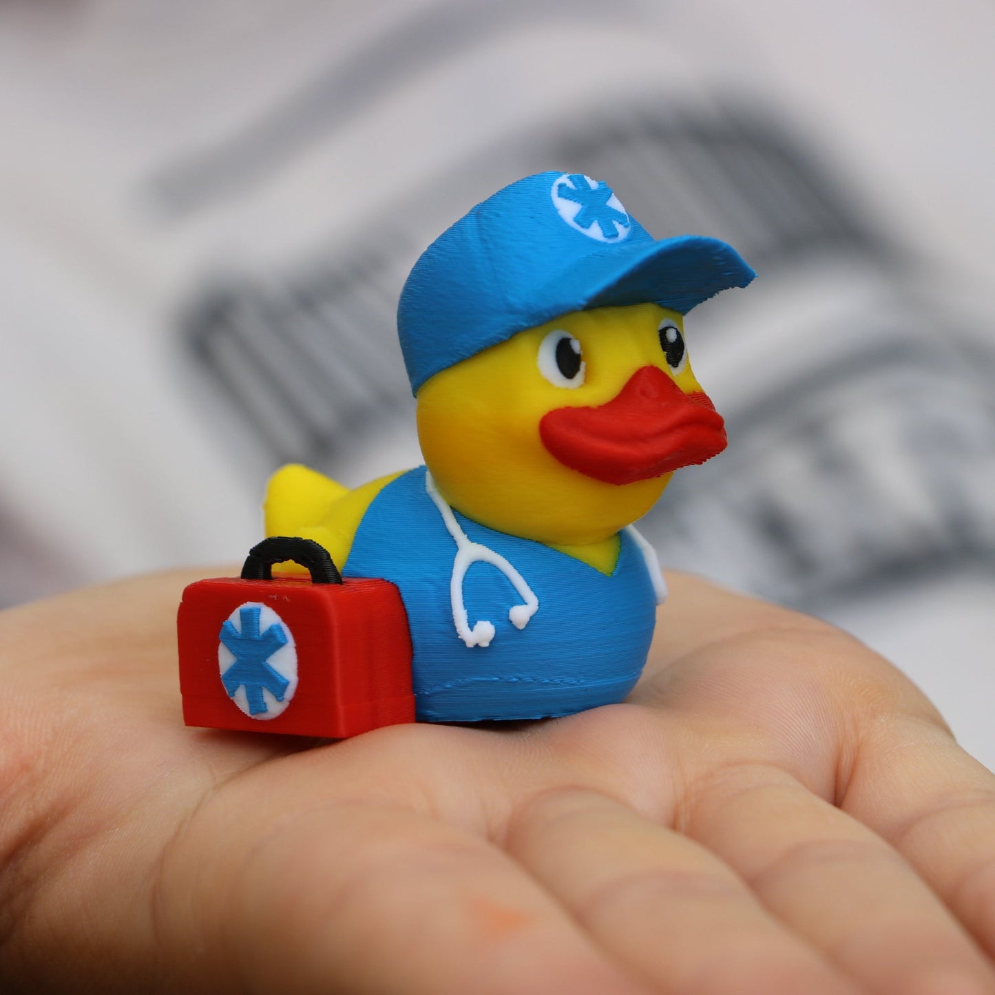 EMT Duck placed in someone's hand.